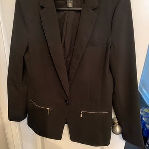WHBM black blazer. Fully lined with functional zippered front pockets.